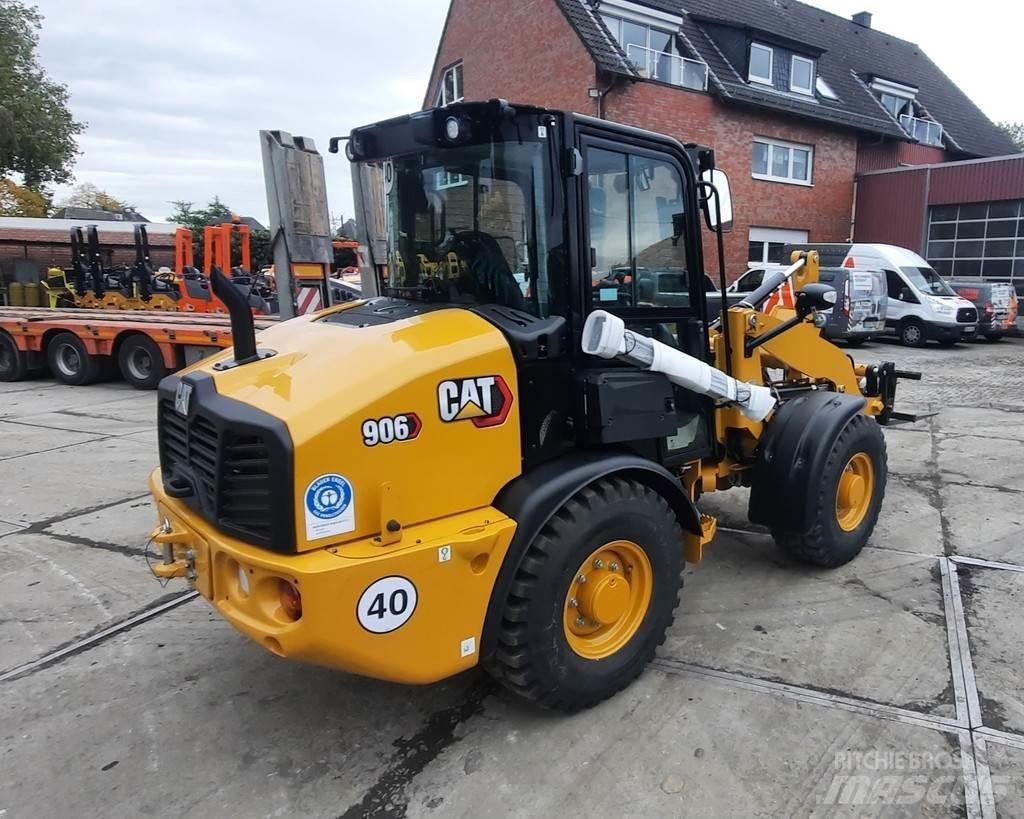 CAT 906 Iekrāvēji uz riteņiem