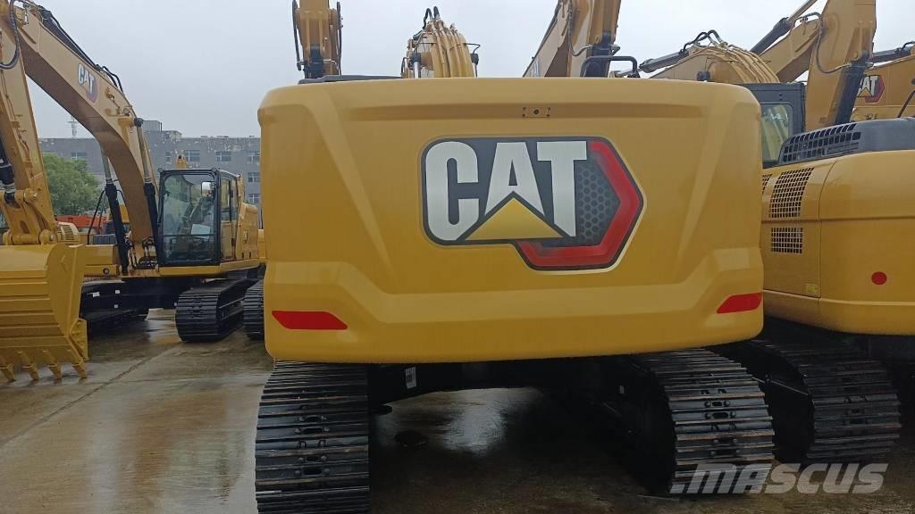 CAT 2022 CAT 323GC Ekskavatori uz riteņiem