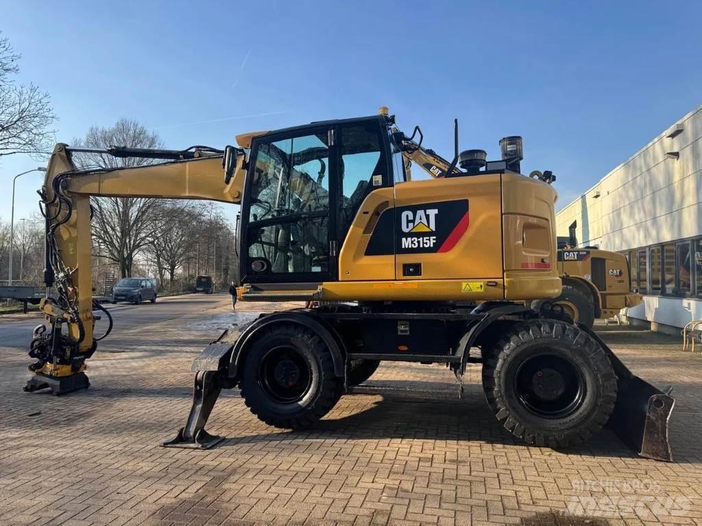 CAT M315F Ekskavatori uz riteņiem