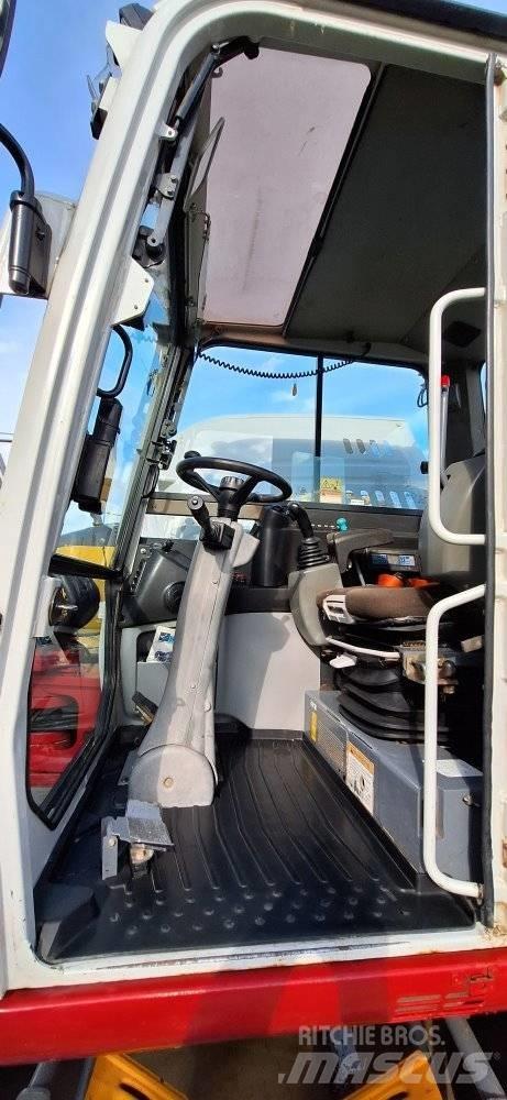 Takeuchi TB 295W Ekskavatori uz riteņiem