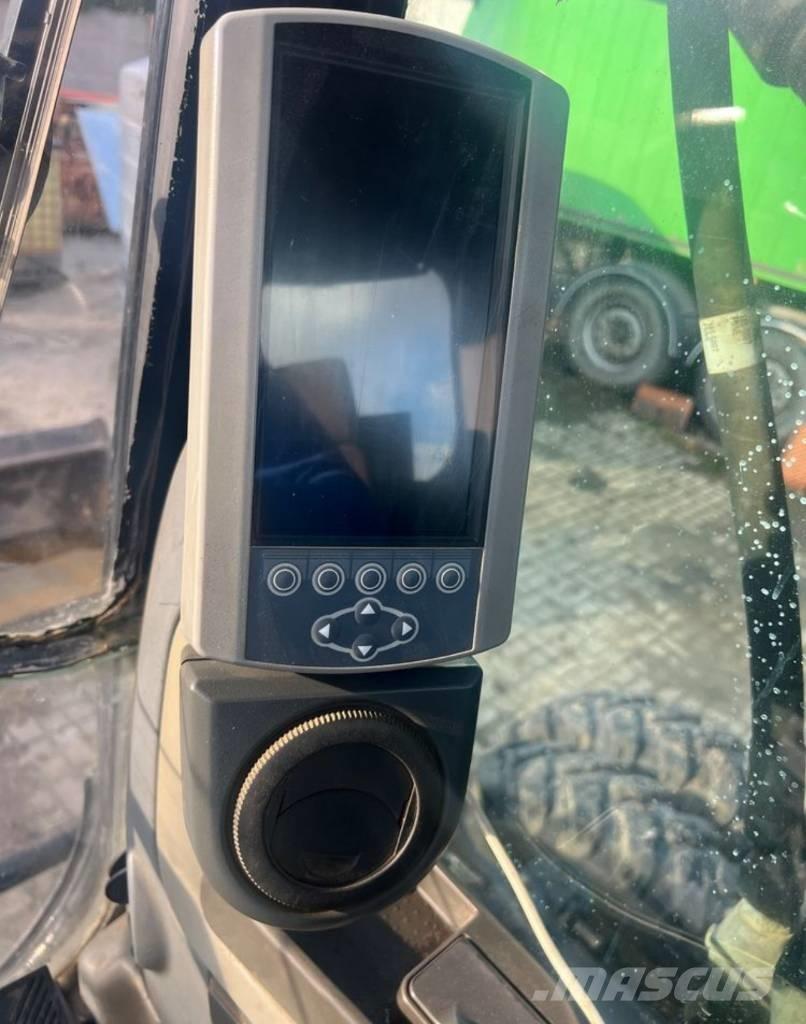 CAT M313D Ekskavatori uz riteņiem