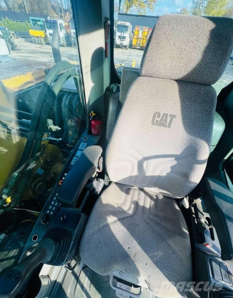 CAT M313D Ekskavatori uz riteņiem