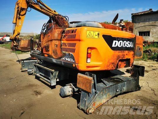 Doosan DX 140W track Sliedes, ķēdes un šasija