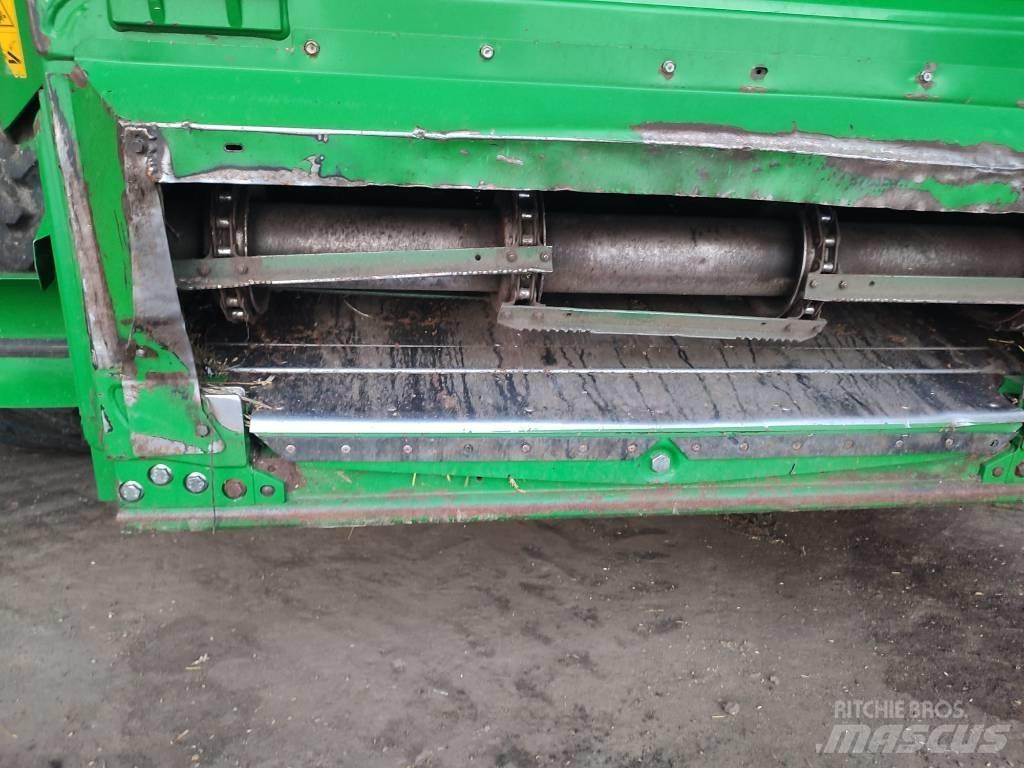 John Deere T 670 i Ražas novākšanas kombaini