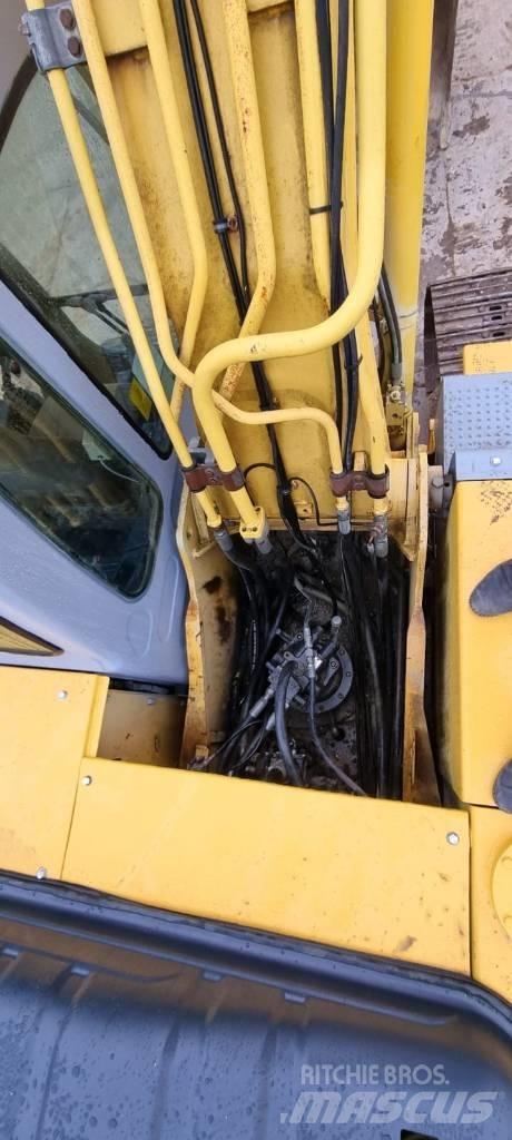 New Holland 215 B Kāpurķēžu ekskavatori