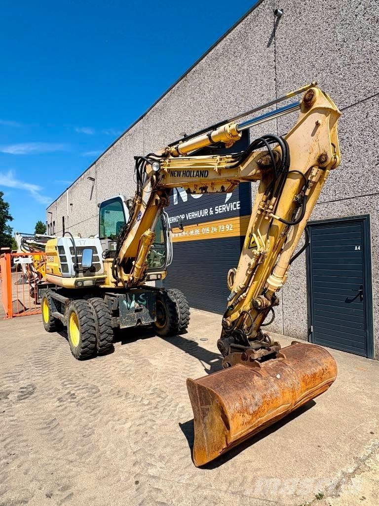 New Holland MH 2.6 Ekskavatori uz riteņiem
