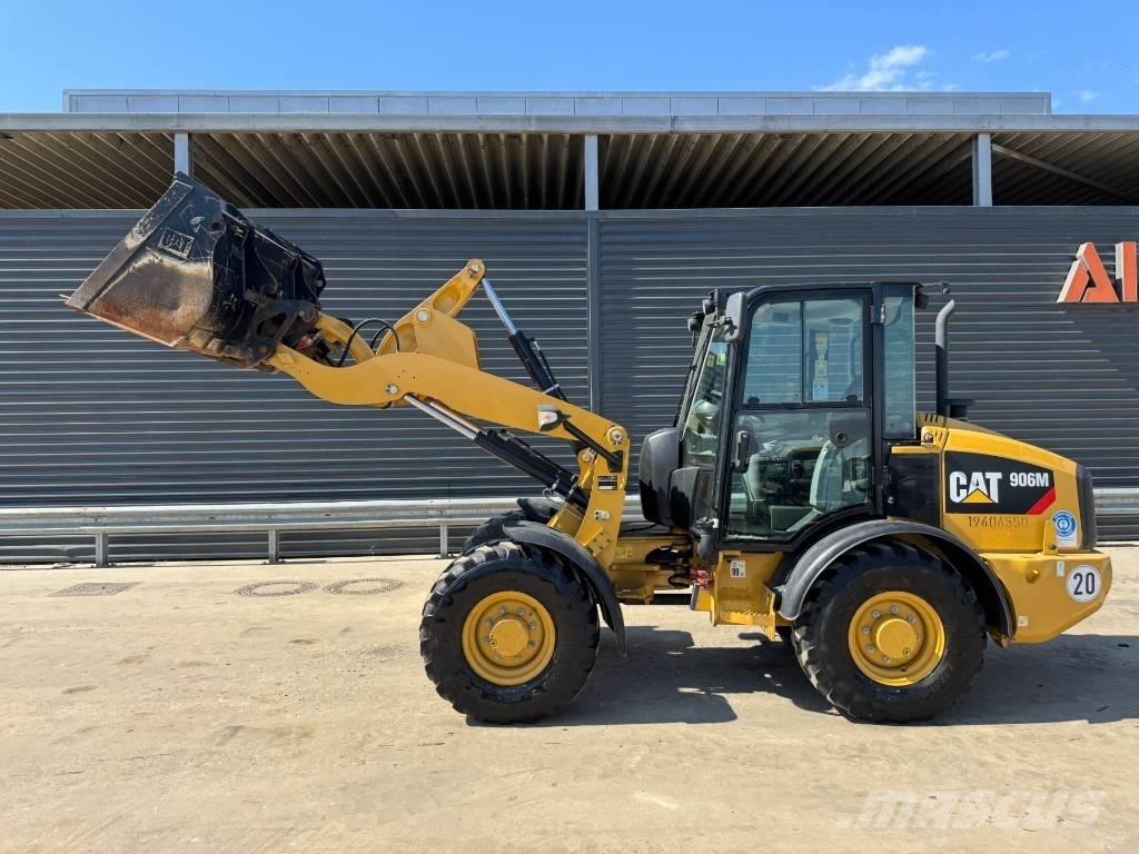 CAT 906M Iekrāvēji uz riteņiem