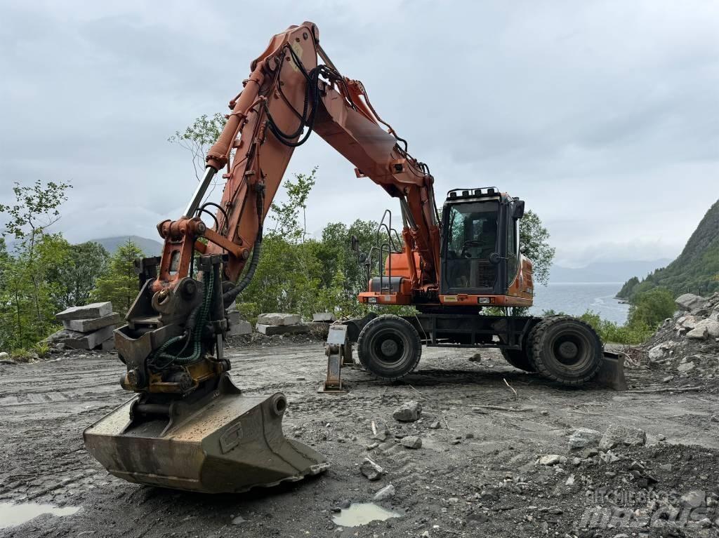 Doosan 140 W Ekskavatori uz riteņiem