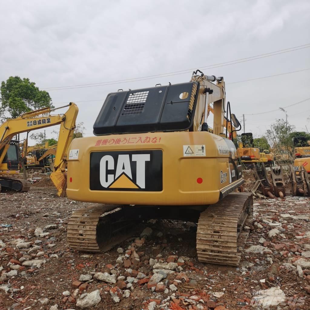 CAT 323DL Kāpurķēžu ekskavatori