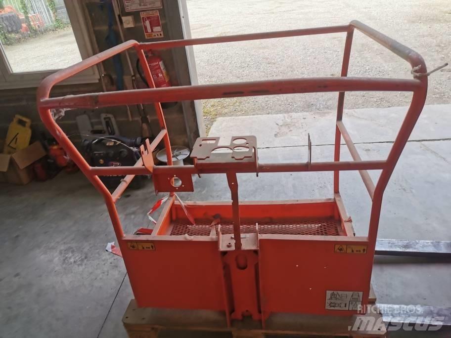 JLG Toucan 10 E Strēles un kausi