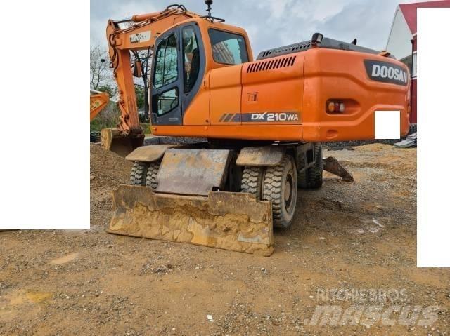 Doosan DX 210 W Ekskavatori uz riteņiem