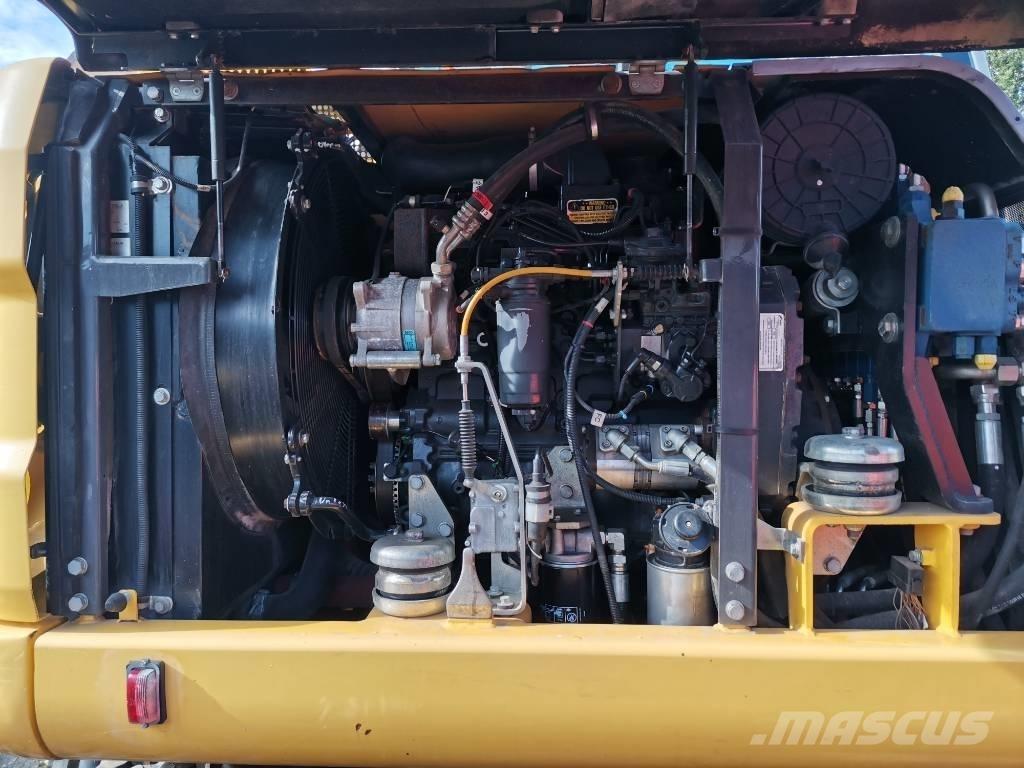 New Holland MH 2.6 Ekskavatori uz riteņiem