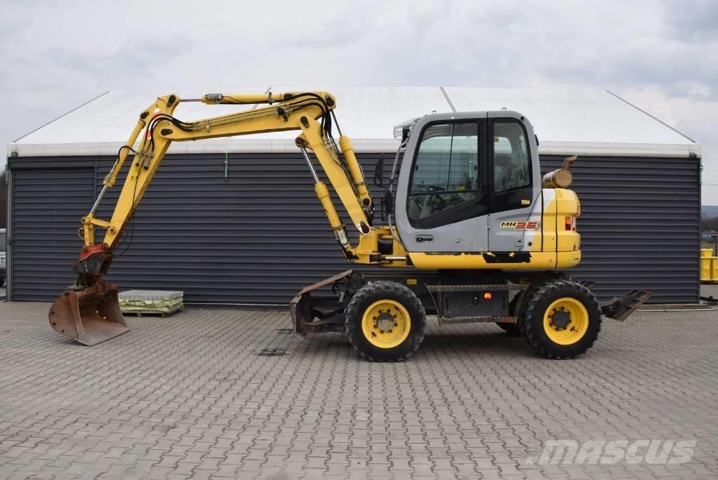 New Holland MH 2.6 Ekskavatori uz riteņiem