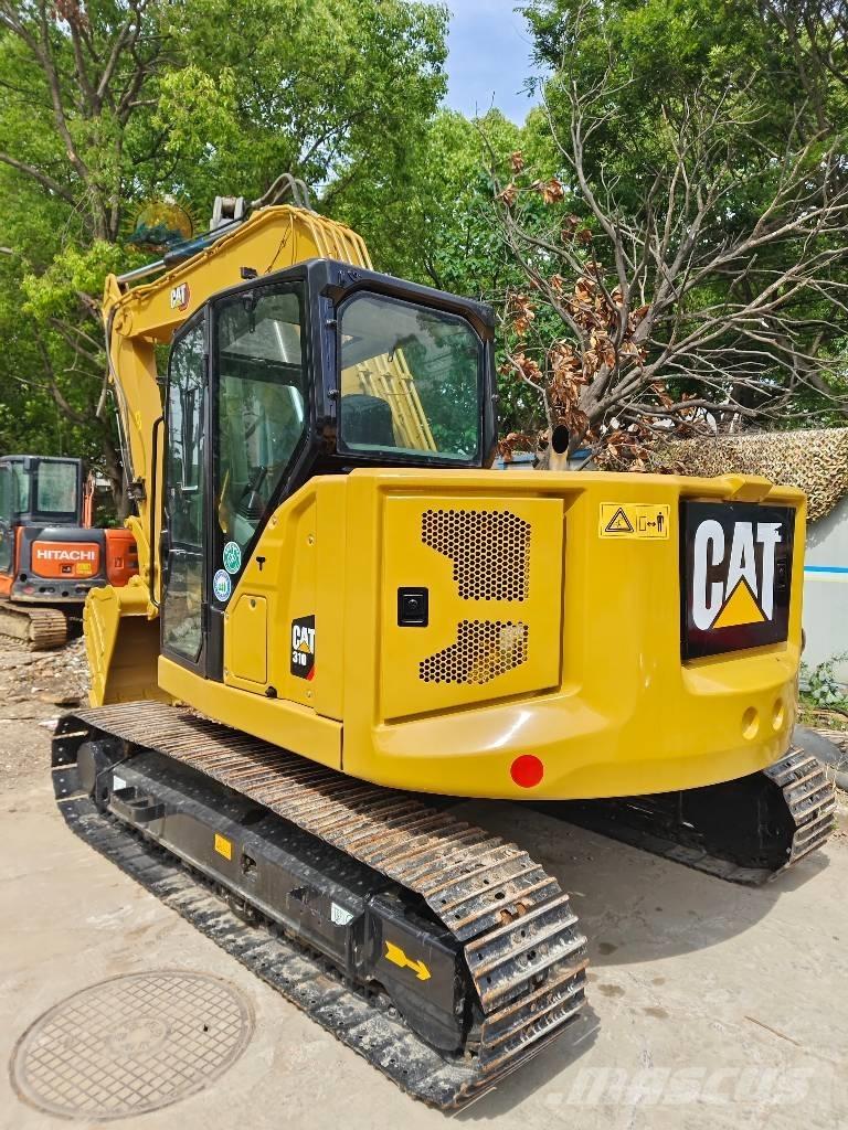CAT 310 Kāpurķēžu ekskavatori