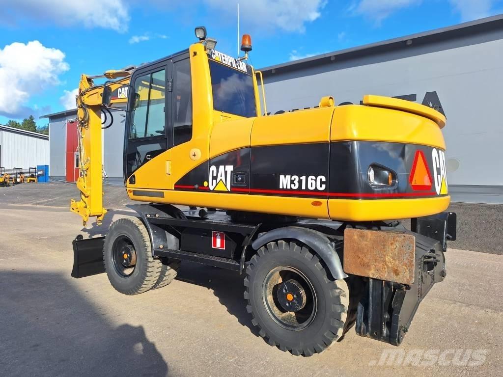 CAT M316C Ekskavatori uz riteņiem