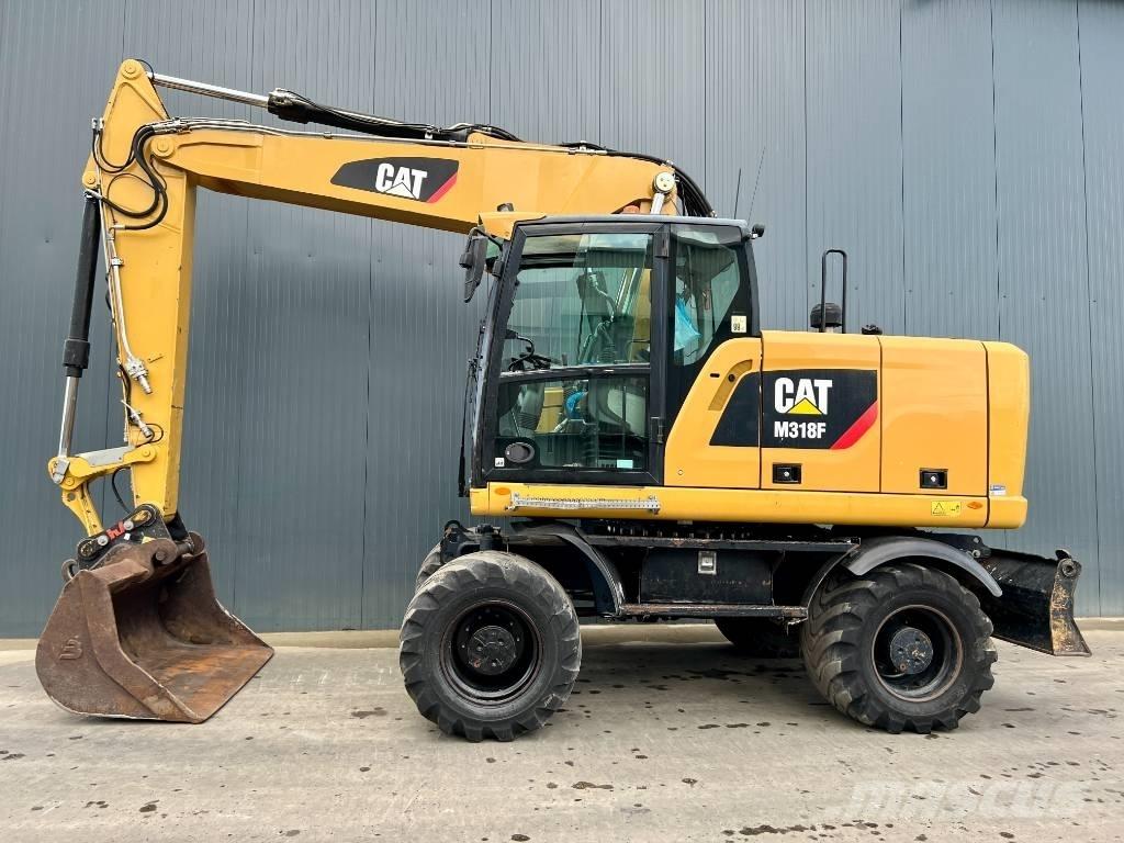 CAT M318F Ekskavatori uz riteņiem