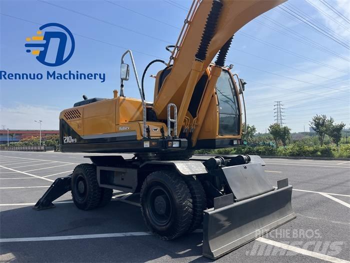 Hyundai 210W-9 Ekskavatori uz riteņiem