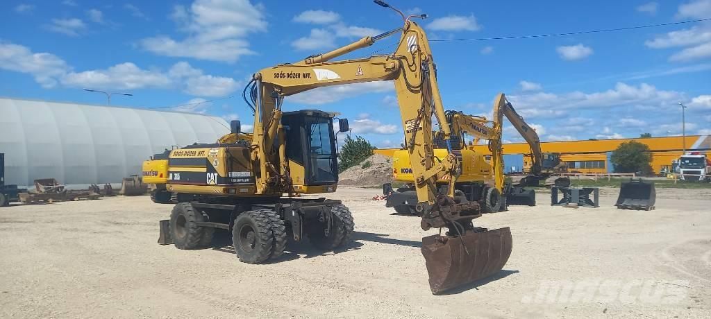 CAT M 315 Ekskavatori uz riteņiem