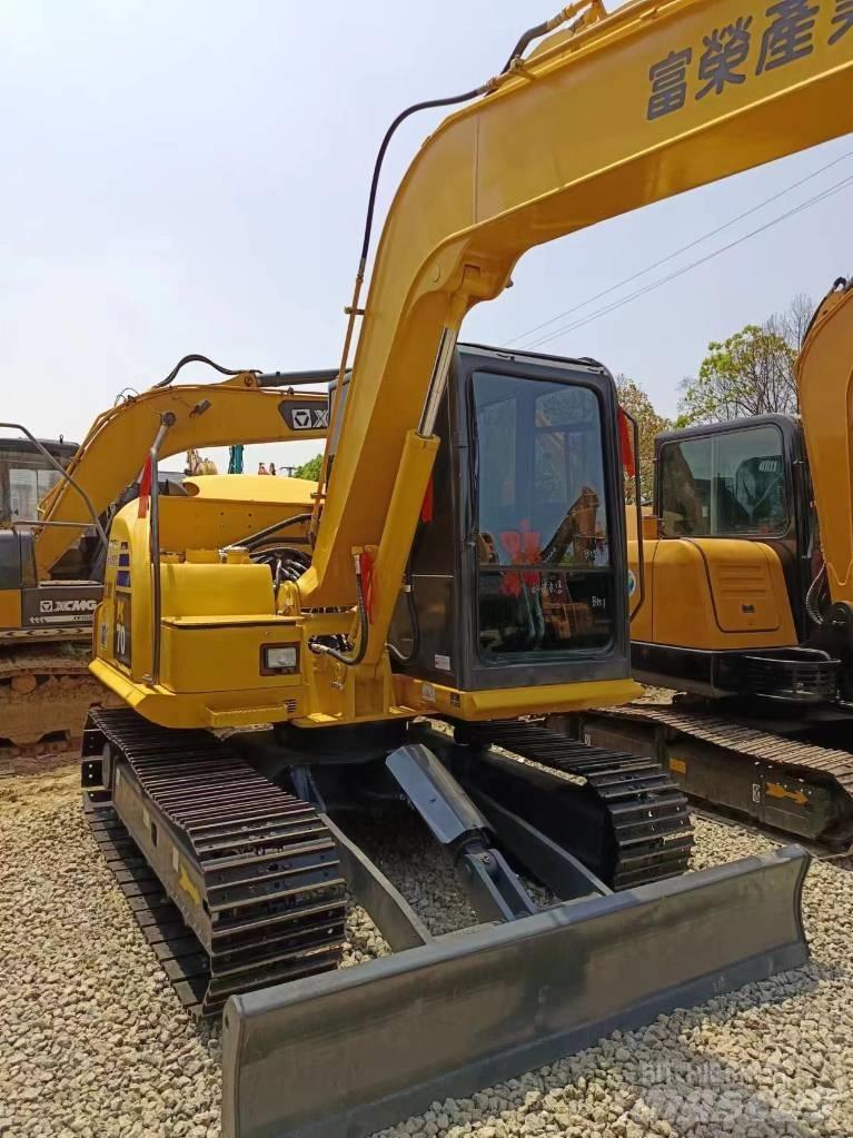 Komatsu PC 70 Vidēja lieluma ekskavatori 7 t - 12 t