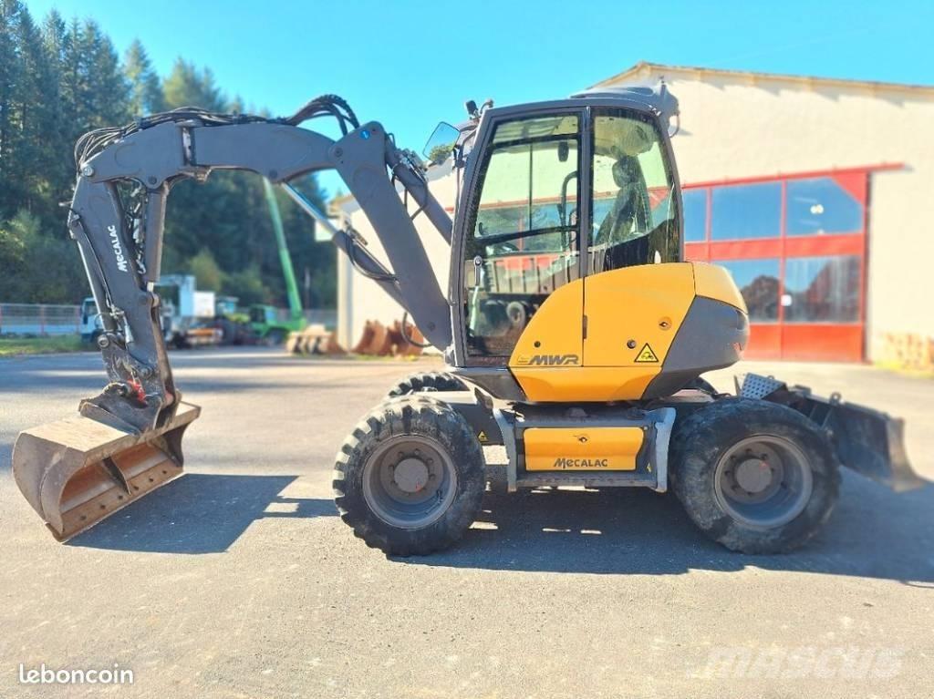 Mecalac 9 MWR Ekskavatori uz riteņiem