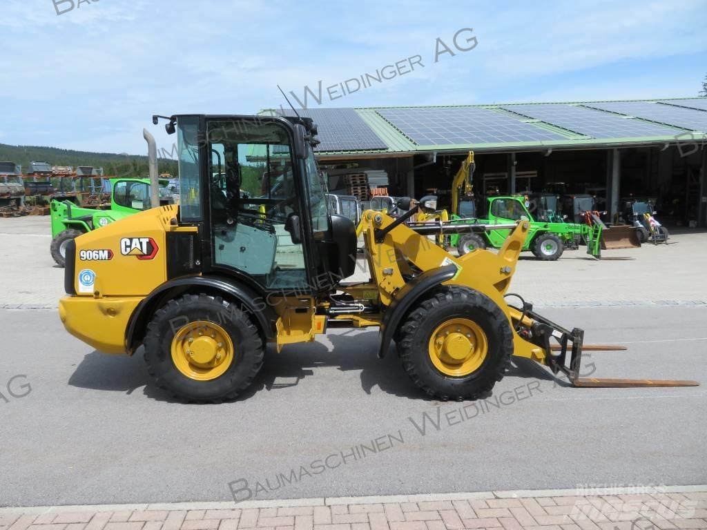 CAT 906M Iekrāvēji uz riteņiem