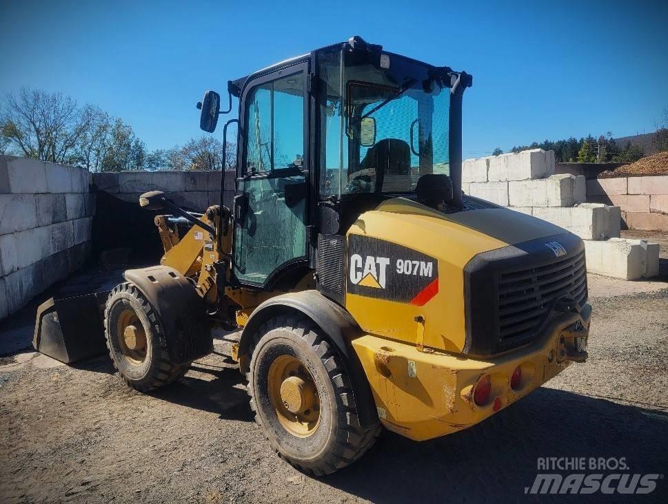 CAT 907 M Iekrāvēji uz riteņiem