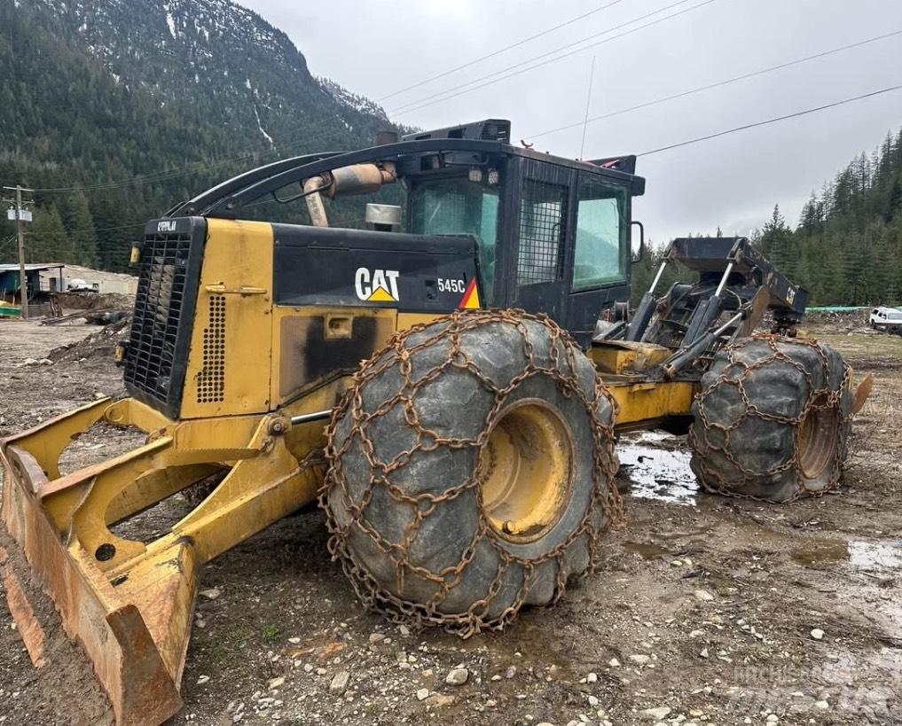 CAT 545 C Šķeldotāji