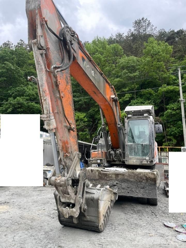 Doosan DX 210 W Ekskavatori uz riteņiem