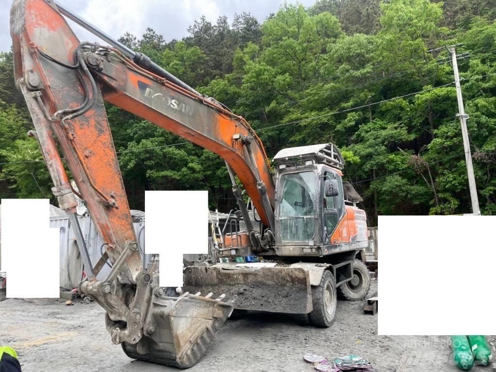 Doosan DX 210 W Ekskavatori uz riteņiem