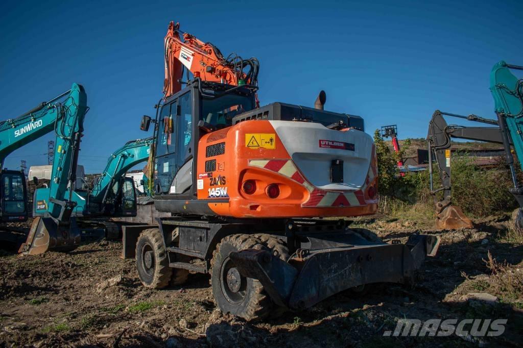  Hitach ZX 145 Ekskavatori uz riteņiem