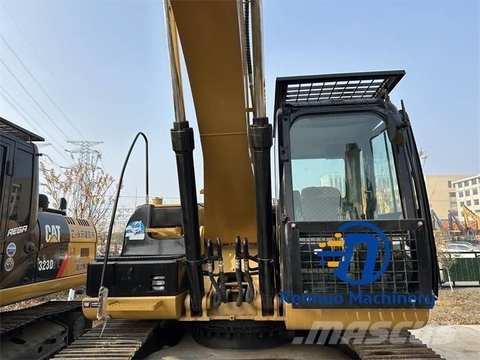 CAT 323D/323/323DL Kāpurķēžu ekskavatori