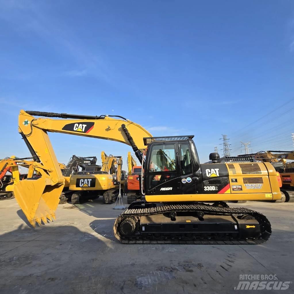 CAT 330 D2 Vidēja lieluma ekskavatori 7 t - 12 t
