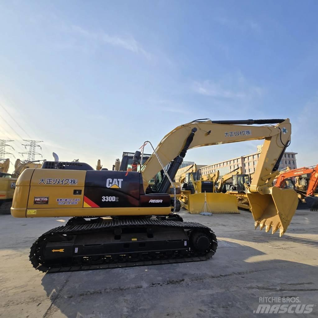CAT 330 D2 Vidēja lieluma ekskavatori 7 t - 12 t