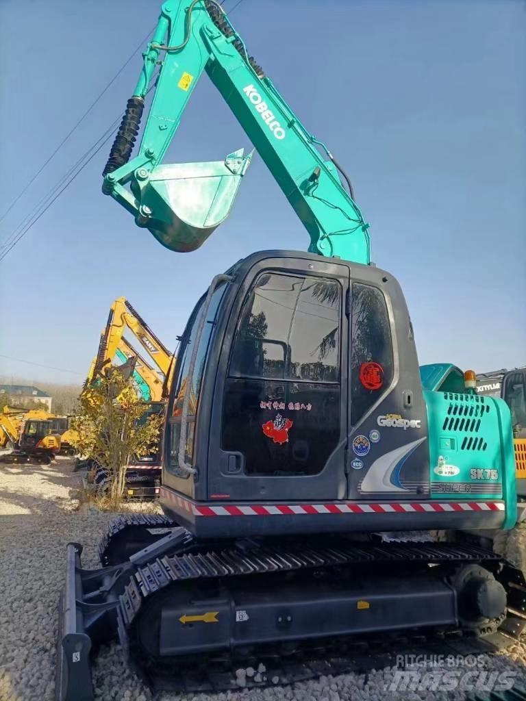 Kobelco SK 75 Vidēja lieluma ekskavatori 7 t - 12 t