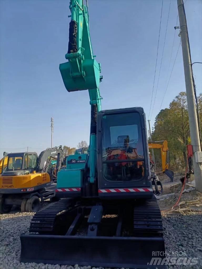 Kobelco SK 75 Vidēja lieluma ekskavatori 7 t - 12 t