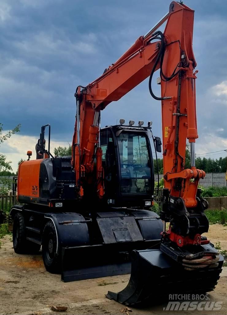Hitachi 140W Ekskavatori uz riteņiem