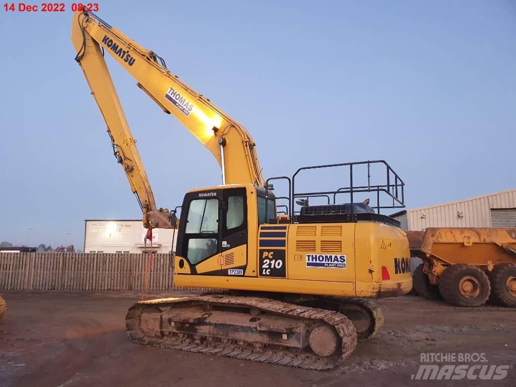 Komatsu PC210LC Ekskavatori tālās sniedzamības darbiem