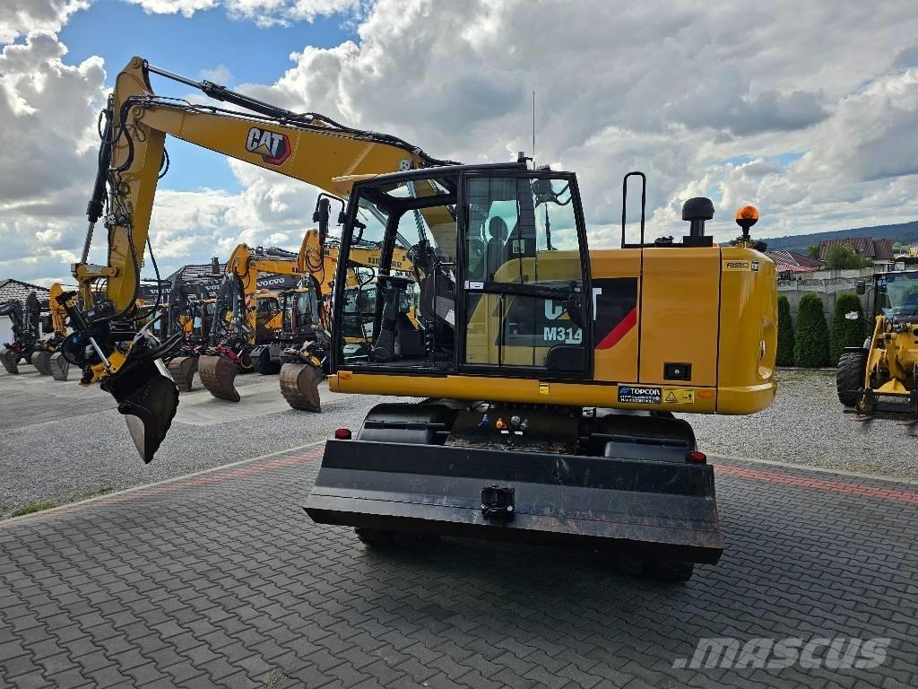 CAT M 314 F Ekskavatori uz riteņiem
