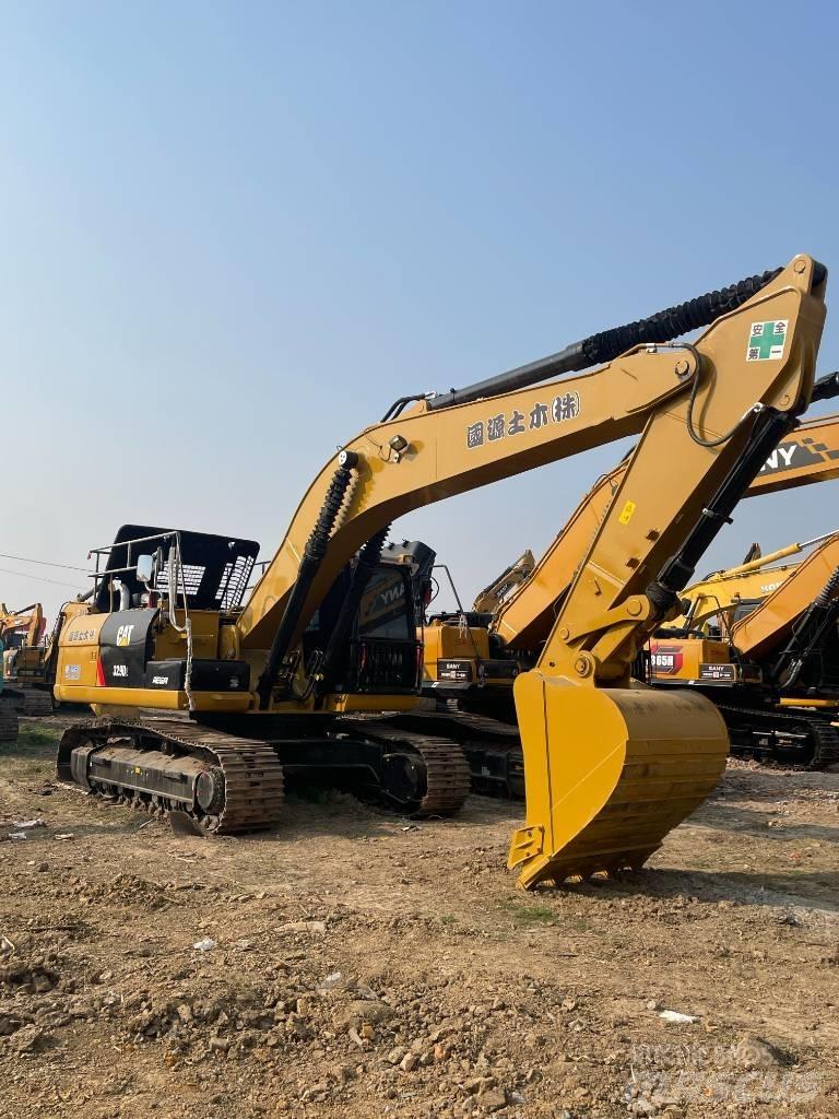 CAT 329D2 Vidēja lieluma ekskavatori 7 t - 12 t