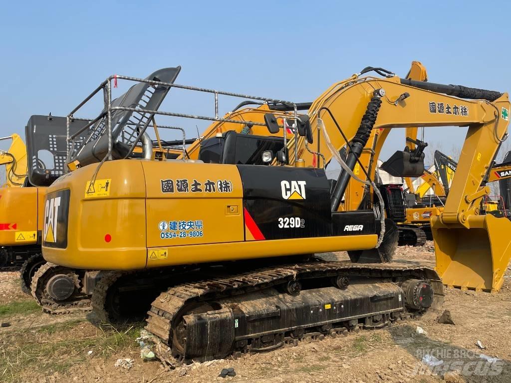 CAT 329D2 Vidēja lieluma ekskavatori 7 t - 12 t