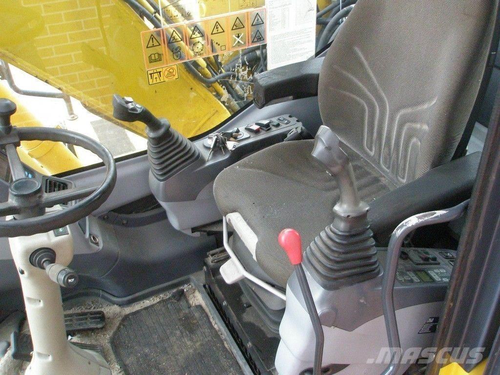 Komatsu PW140-7 Ekskavatori uz riteņiem