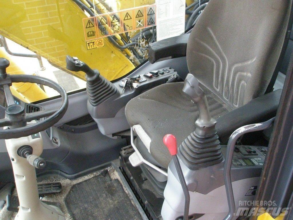 Komatsu PW140-7 Ekskavatori uz riteņiem