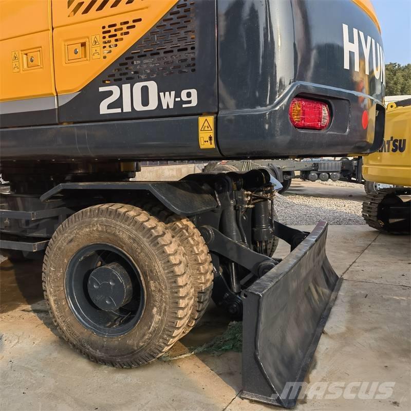 Hyundai 210W -9 Ekskavatori uz riteņiem