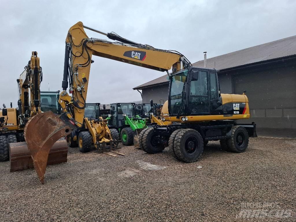 CAT M 316D Ekskavatori uz riteņiem