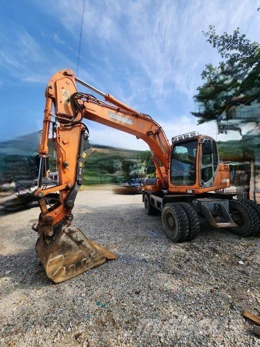 Doosan DX 140 W Ekskavatori uz riteņiem