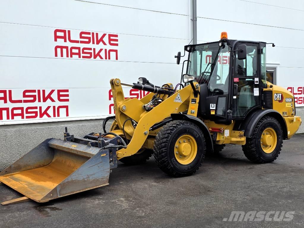 CAT 906 Iekrāvēji uz riteņiem