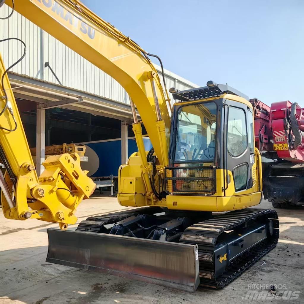 Komatsu PC 128 US Vidēja lieluma ekskavatori 7 t - 12 t