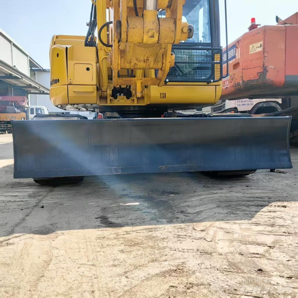 Komatsu PC 128 US Vidēja lieluma ekskavatori 7 t - 12 t