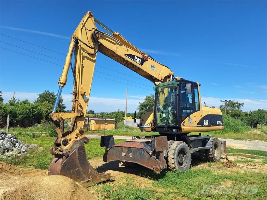 CAT M 318 C 4X4 Būvniecība- Citi
