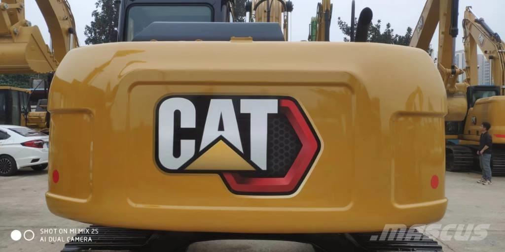 CAT 2021 CAT 313D2GC Ekskavatori uz riteņiem